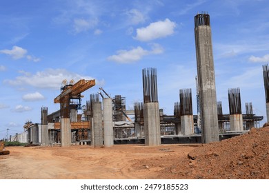 New construction site with crane and mechanical equipments on sunset daylight background. construction industry.