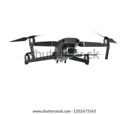 New dark grey drone quadcopter with digital camera and sensors flying isolated on white background