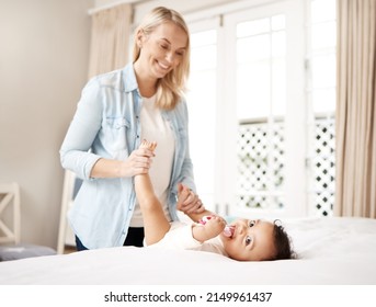 Its A New Day, Time To Make New Memories. Shot Of A Woman Bonding With Her Baby At Home.