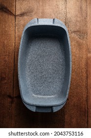 New Deep Oven Roasting White Stone Pan On Rustic Wooden Table