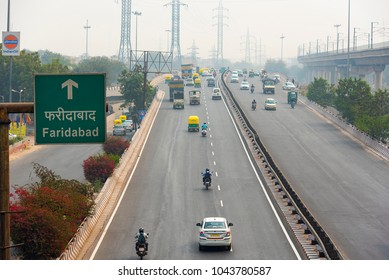 NEW DELHI - FEB 23: Car Traffic In New Delhi, City Covered In The Smog On February 23. 2018 In India 