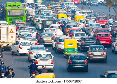 NEW DELHI - FEB 23: Traffic jam with cars, mopeds and auto rickshaws in a road on New Delhi on February 23. 2018 in India