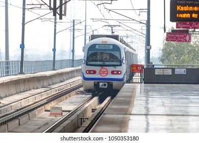 NEW DELHI - FEB 24: New Delhi Metro Station And A Modern Train On February 24. 2018 In India