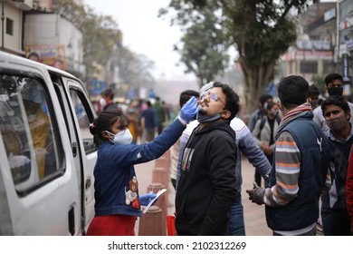 New Delhi, India 01-07-2022 - A Health Worker Takes A Swab Sample For Covid-19 Test In Chandni Chowk Market On January 07, 2021 In Old Delhi, India. 