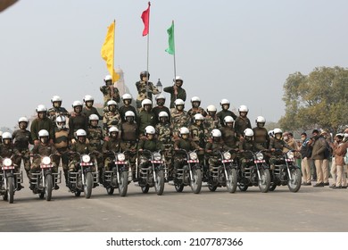 New Delhi, India 01-17-2022 - BSFs All-women Biker Team Seema Bhawani Practice Daredevil Stunts During The Rehearsal For The Upcoming Republic Day At Rajpath