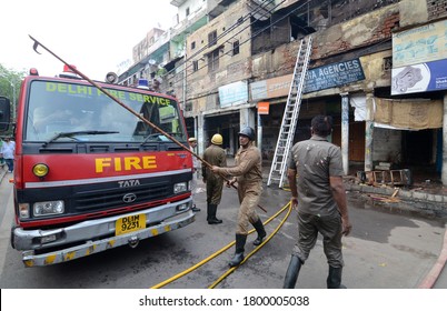 New Delhi/ India - 07/06/2019: Fire Fighters Trying To Douse A Fire That Broke Out At A Brothel At G B Road In New Delhi.