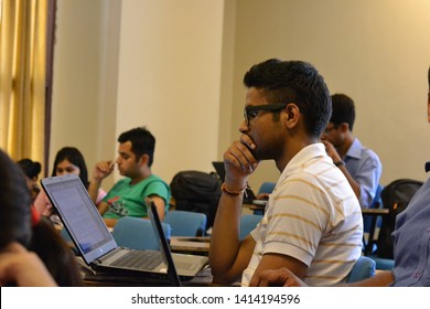 New Delhi, Delhi, India - 09/05/2014 : A Student Prepares For An Exam While Studying On His Laptop.