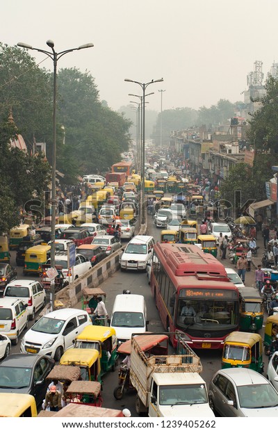 NEW DELHI - INDIA - 11 NOVEMBER 2017. Traffic jam on the\
polluted streets of New Delhi, India. Delhi has the highest number\
of motor vehicles and the traffic congestion is limited in few\
areas. 