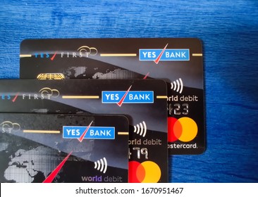 New Delhi, India, 2020. Multiple Yes Bank Premium Credit/Debit Cards On A Blue Background. A Corporate Bank With Retail Banking And Asset Management Functions. Is Taken Over By RBI On Fraud Charges