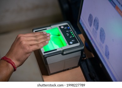 New Delhi, India- 21 January 2018, Machine Capture Biometric Info Of Fingerprints From A Man During  Registration Process Of Aadhaar Card At Aadhaar  Enrollment Centre New Delhi, India, 