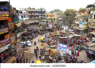 NEW DELHI, INDIA - 21 JANUARY 2017: Busy Indian Street Market In New Delhi, India. Delhi's Population Surpassed 18 Million People.