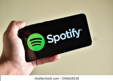 New Delhi, India - 31 october, 2019: hand holding smartphone with Spotify application 