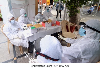 NEW DELHI, INDIA - APRIL 23, 2020: Coronavirus Test In India, A Medical Staff Collect Swab For Covid-19 Test During The Nationwide Lockdown To Curb The Spread Of Coronavirus.