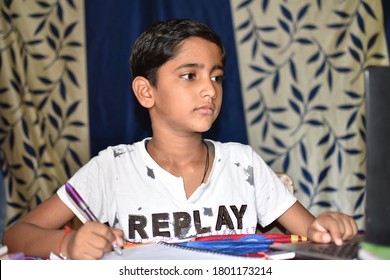 New Delhi, India. August 18, 2020.  Indian Child Student Learning By Online Class On Laptop At Home.