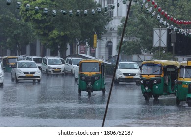 New Delhi, India - August 18, 2020 - People And Commuters Get Drenched In The Rain At Connaught Place In New Delhi.