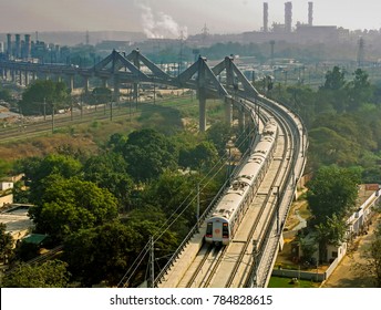 New Delhi India December 12,2006: Aerial View Of Metro Rail Departure From High Level Station And Overhead Bridge New Delhi,India 