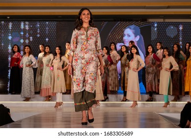 
New Delhi, Delhi / India - February 2020: Young Indian Beautiful Female  Models Performing Ramp Walk In Traditional Indian Designer Dress During A Fashion Show