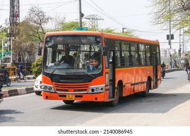 New Delhi, India - February 25, 2022: Orange City Bus Tata-Marcopolo In A City Street.