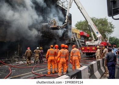 New Delhi, India- June 12 2021: Team Members Of National Disaster Relief Force NDRF Waiting In Standby, Precautionary Measures Taken,  A Major Fire Broke Out Of Shops In Lajpat Nagar Market. 