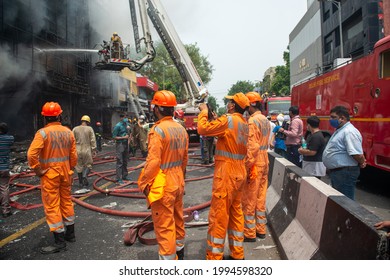 New Delhi, India- June 12 2021: Team Members Of National Disaster Relief Force NDRF Waiting In Standby, Precautionary Measures Taken,  A Major Fire Broke Out Of Shops In Lajpat Nagar Market. 