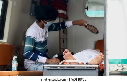 New Delhi, India, June 20, 2020:  Health Worker Takes A Sample Of A Young Woman For COVID-19 Ag Rapid Antigen Test At Govt School.