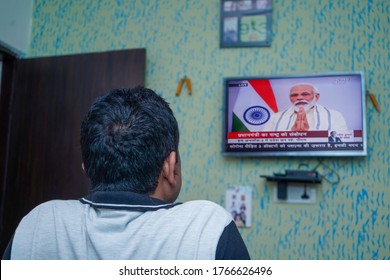 New Delhi, Delhi/ India- June 30 2020: A Man Watching The Live Tv Of Prime Minister Narendra Modi's Announcement About Unlock India From Corona Virus At A House In New Delhi.