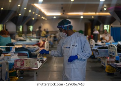 New Delhi, India- June 7 2021: Temporary Covid Care Centre In Delhi, A Health Worker In A PPE Kit Is Seen Inside A Temporarily Converted Isolation Ward For Covid-19 Patients, At Banquet Hall