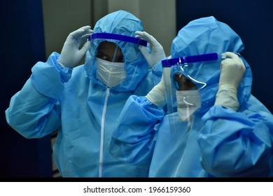 New Delhi, India March 17 2021 Indian Doctors Wearing Blue PPE Kit And Surgical Mask.