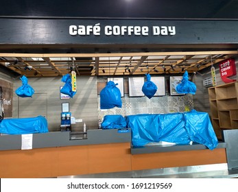 New Delhi, India - March 29, 2020: A Closed Cafe Coffee Day Restaurant Inside The Empty DEL Indira Gandhi International Airport, During The Coronavirus COVID-19 Pandemic Lockdown And Travel Ban