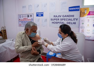 New Delhi, India, March 3 2021: Senior Citizen Gets A Vaccine Shot During The Second Phase Of Covid-19 Vaccination Drive For People Over 60 Year Old Or Those Aged Between 45-59 Who Have Comorbidities