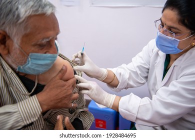 New Delhi, India, March 3 2021: Senior Citizen Gets A Vaccine Shot During The Second Phase Of Covid-19 Vaccination Drive For People Over 60 Year Old Or Those Aged Between 45-59 Who Have Comorbidities