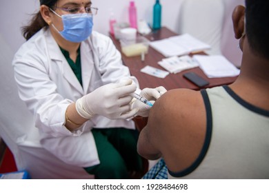 New Delhi, India, March 3 2021: Senior Citizen Gets A Vaccine Shot During The Second Phase Of Covid-19 Vaccination Drive For People Over 60 Year Old Or Those Aged Between 45-59 Who Have Comorbidities