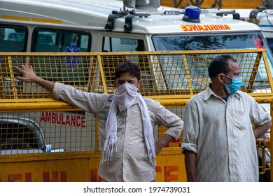 New Delhi, India, May 13 2021: Ambulance Driver In Mask Near Emergency Entrance Of Lok Nayak Covid-19 Hospital, Dedicated To Covid-19 Patient, Man In Mask