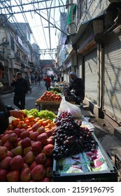 New Delhi, India - May 2022 : Indian Street Vendor With Fresh Fruits In Delhi.