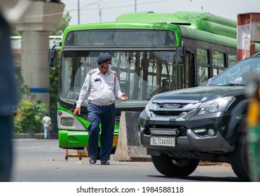 New Delhi, India, May 31 2021: Sub Inspector Of Delhi Traffic Police Working In Delhi Uttar Pradesh Border Near Uttar Pradesh.