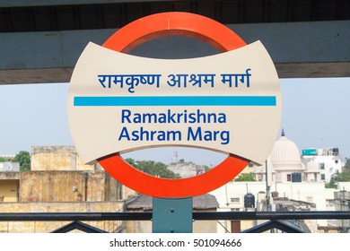 NEW DELHI, INDIA - NOVEMBER 1, 2014: Tube Sign Of Delhi Metro Rail, Ramakrishna Ashram Marg Station