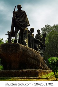 New Delhi, India - October 10th, 2016: Statue Depicting Mahatma Gandhi Leading His Followers During The Famous Dandi March, Also Known As The Salt March Movement Of 1930