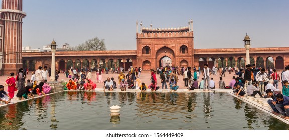 NEW DELHI, INDIA - OCTOBER 28, 2019: Panorama of the pond at the Jama Masjid mosque in New Delhi, India