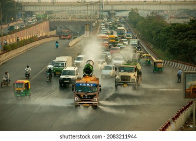 New Delhi, India-23 Nov 2021: A Municipal Truck Uses Anti Smog Gun To Spray Water On The Road For Dust Suppression To Reduce Air Pollution In Delhi.