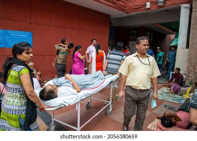 New Delhi, India-Aug 11 2021: Transporting Patient On Stretcher At AIIMS Hospital. A Scene Of A General Hospital Premises On A Busy Morning Where Patients Are Seen Transporting To Other Building