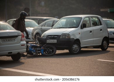 New Delhi, India-Aug 11 2021: Bike car accident in delhi, Motorbike Accident on the road with a car