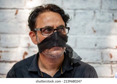 New Delhi, India-Aug 9 2019: Kashmiri man shounting and protesting against after The Parliament passed the resolution revoking Article 370, which gave special status to Jammu and Kashmir