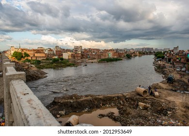 New Delhi; India-August 28 2020:  Hindon River Most Polluted River In Delhi NCR Area Passing Near Noida Slum Area.