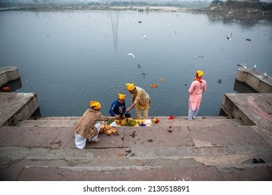 New Delhi, India-Feb 2 2022: Sindhi Hindus followers of Jhulelal   worshipping yamuna river near kashmiri gate.