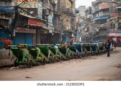 New Delhi, India-Jan 16 2022: Wooden Hand Carts Parked At Road Side At Sadar Bazaar During An Ongoing Weekend Curfew Imposed In Old Delhi Market 