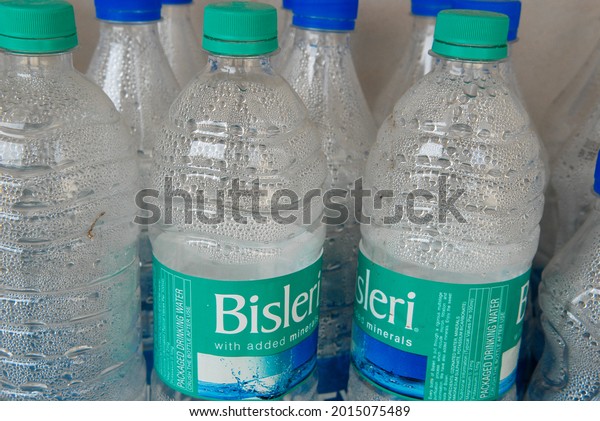 New Delhi, India-July 22 2021: water\
bubbles inside wastes and pet bottles at home for recycling. waste\
of  plastic water bottles kept in home,\
India