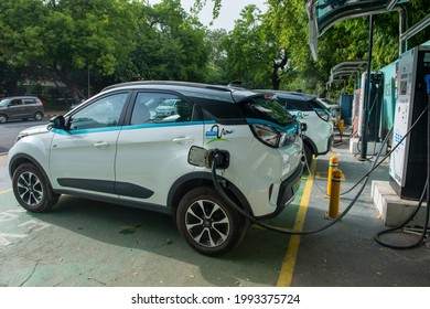 New Delhi; India-June 15 2021: Indian government owned Electric cars are being charged at the charging stations near Indian parliament house in New Delhi, 