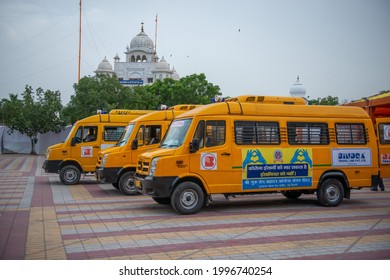 New Delhi, India-June 15 2021: School bus converted in Ambulance during second wave of coronavirus in delhi, parking at covid care centre parking area at rakabganj gurudwara.