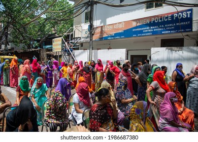 New Delhi, India-June 5 2021: Indian sex workers gathered Near women polic station or post for An Free Ration food kit distribution event, they are job less during lockdown.