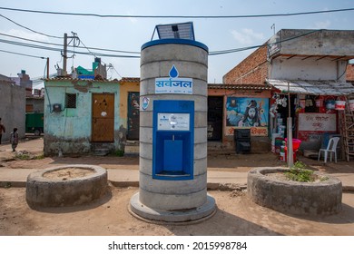 New Delhi, India-March 25, 2014: Sarvajal Water ATM In Jhuggi Jhopri Colony In New Delhi, The Water ATMs In The Colony Are Operated By A Pre Paid Card That Can Be Topped Up At The Plant 